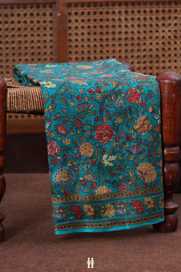 Printed Silk Saree In Teal Blue With Floral Design
