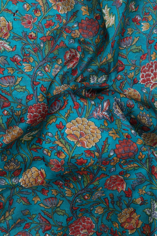 Printed Silk Saree In Teal Blue With Floral Design