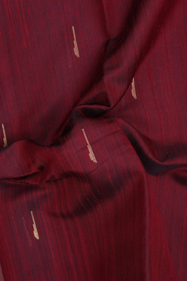 Jute Saree In Maroon With Malli Moggu Buttas
