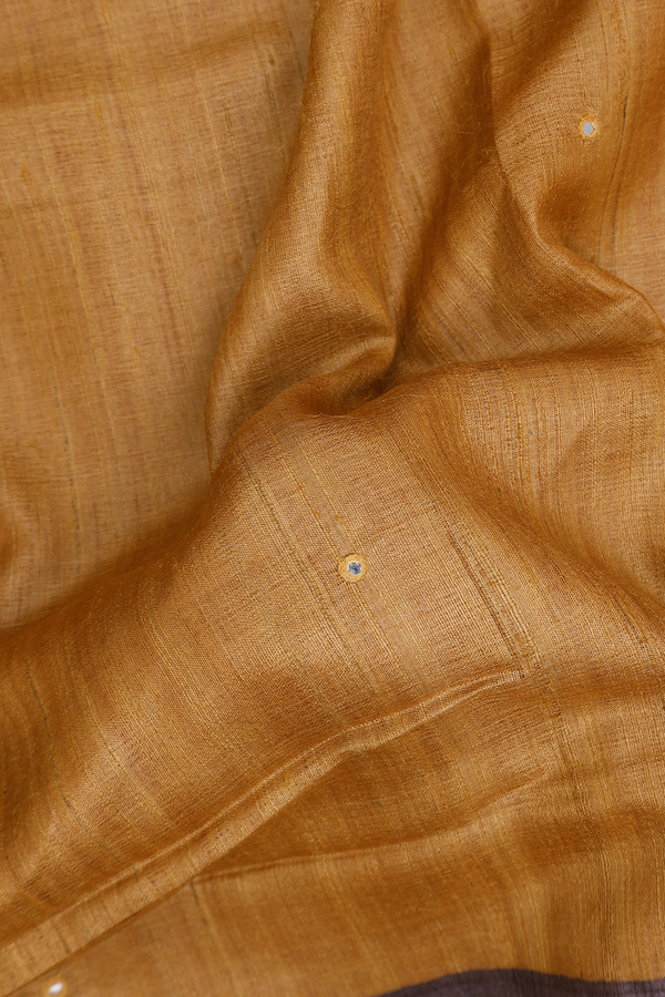 Tussar Silk Saree In Golden Brown With Mirror Work Buttas