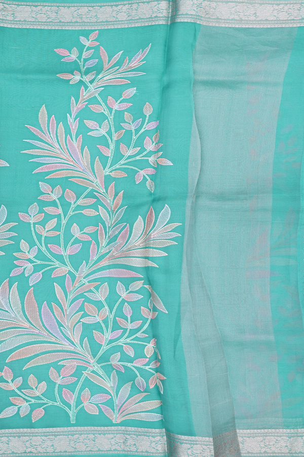 Organza Silk Saree In Turkish Blue With Leaf Design