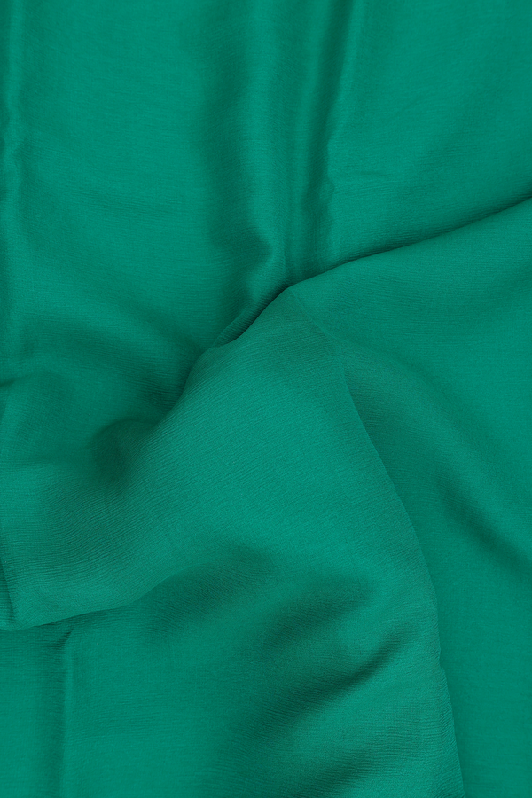 Chiffon Saree In Plain Emerald Green With Zari Border