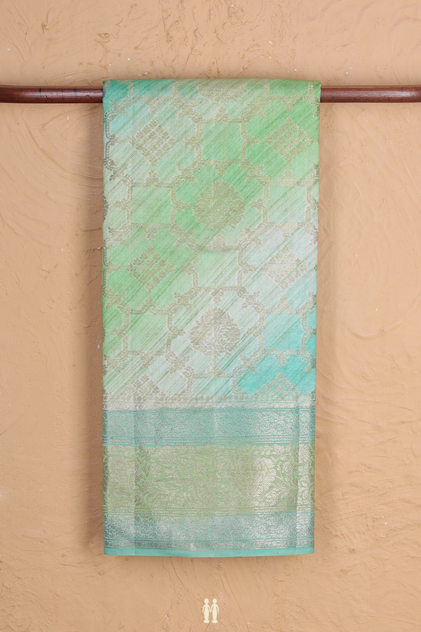 Raw Silk Saree In Shades Of Green With Allover Design