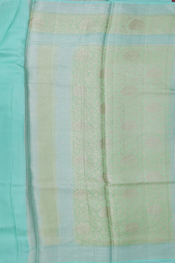 Raw Silk Saree In Shades Of Green With Allover Design