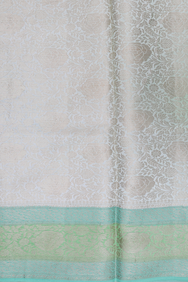 Raw Silk Saree In Shades Of Green With Allover Design