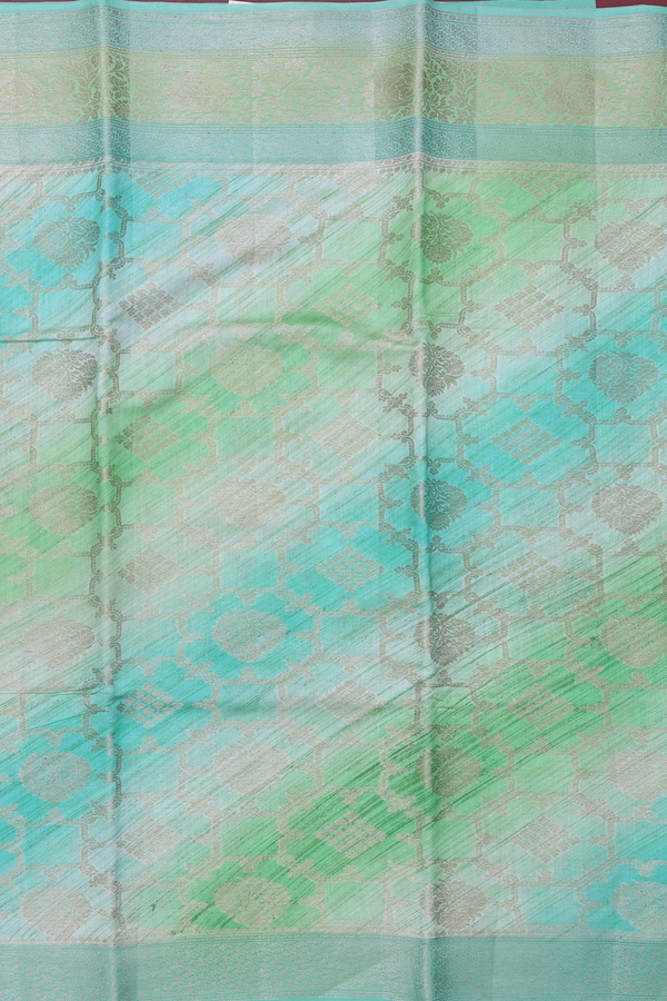 Raw Silk Saree In Shades Of Green With Allover Design