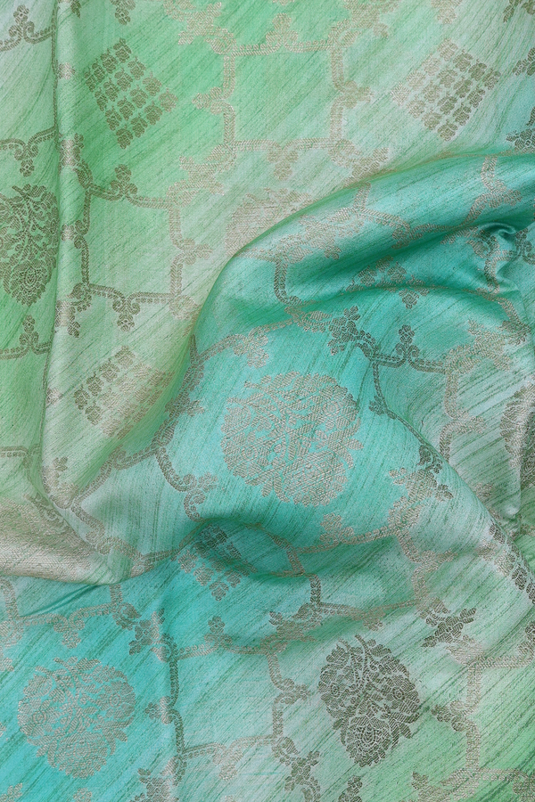Raw Silk Saree In Shades Of Green With Allover Design
