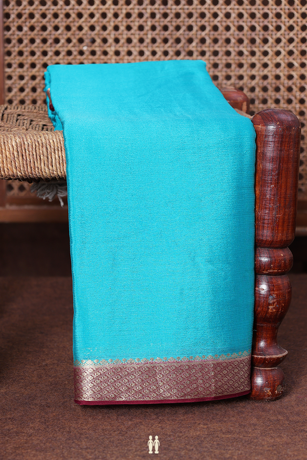 Chiffon Saree In Bluish Green With Contrast Border