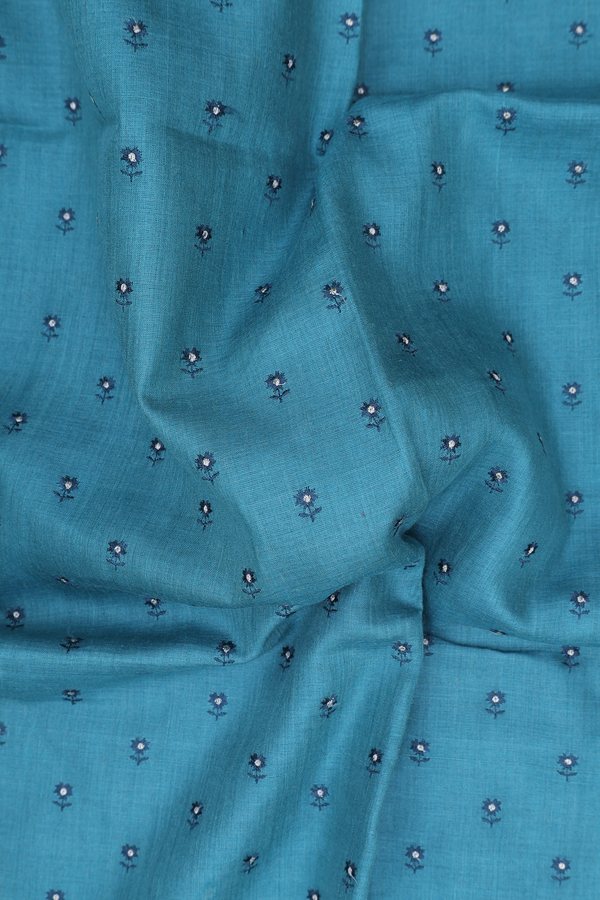 Tussar Silk Saree In Turkish Blue With Floral Buttis