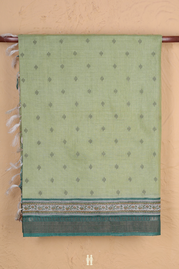 Tussar Silk Saree In Moss Green With Floral Buttis