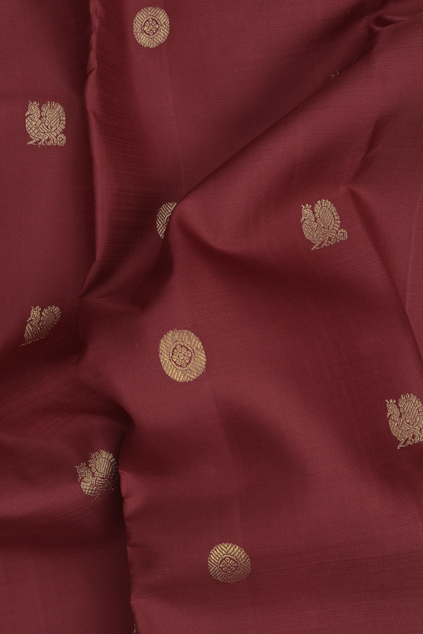 kanchipuram Silk Saree In Maroon With Peacock Buttas