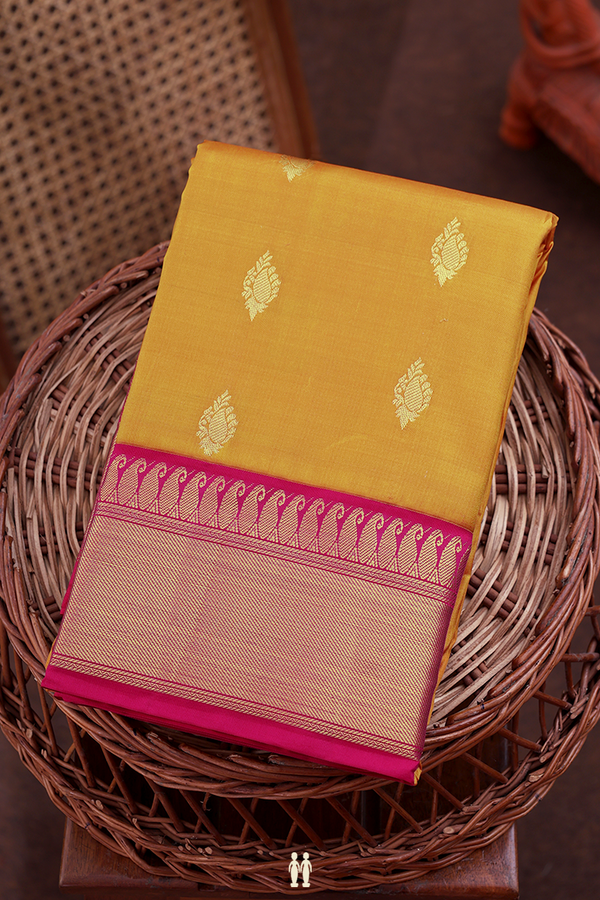 Kanchipuram Silk Saree In Golden Yellow With Paisley Buttas