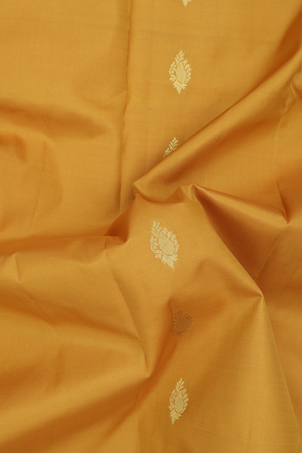 Kanchipuram Silk Saree In Golden Yellow With Paisley Buttas