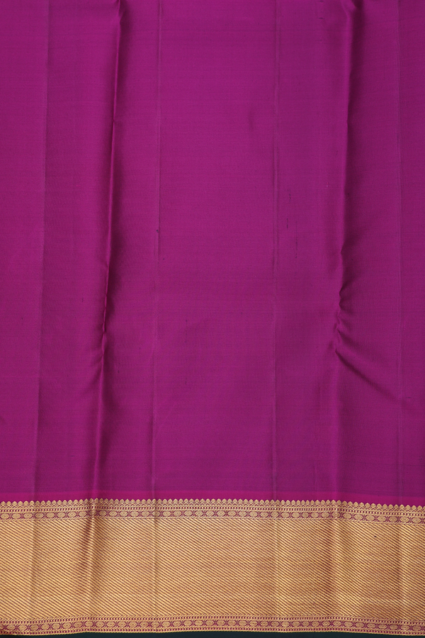Kanchipuram Silk Saree In Dark Green With Peacock Buttas