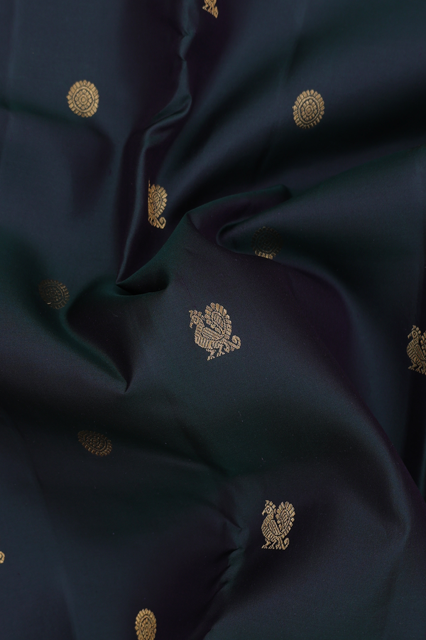Kanchipuram Silk Saree In Dark Green With Peacock Buttas