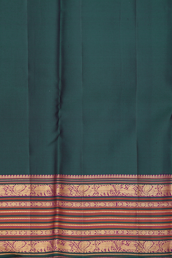 Kanchipuram Silk Saree In Dark Green With Floral Buttas