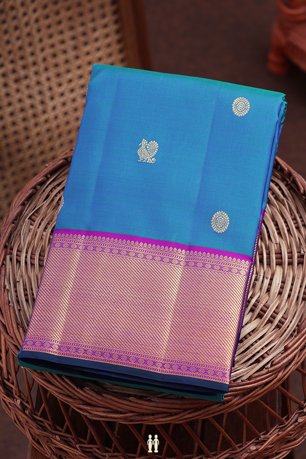Kanchipuram Silk Saree In Capri Blue With Peacock Buttas