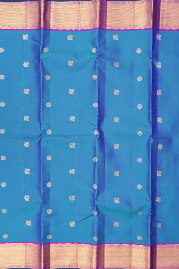 Kanchipuram Silk Saree In Capri Blue With Peacock Buttas
