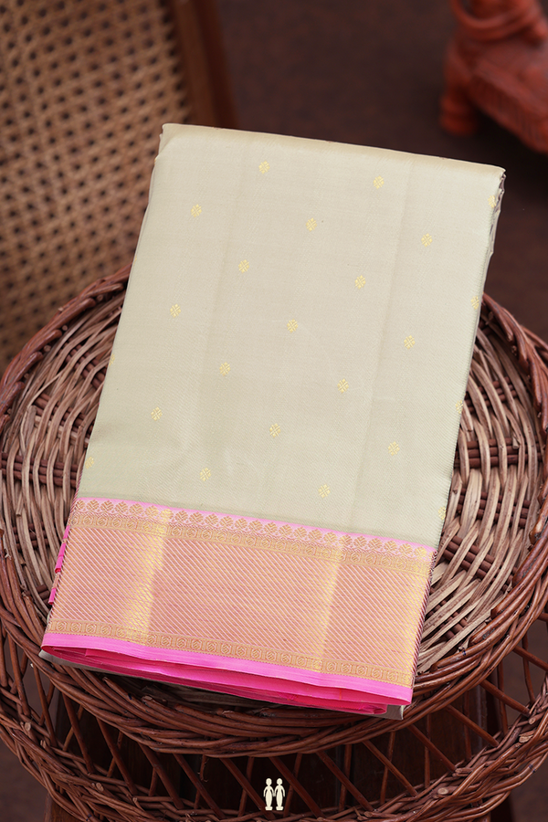 Kanchipuram Silk Saree In Pastel Khaki With Zari Buttis