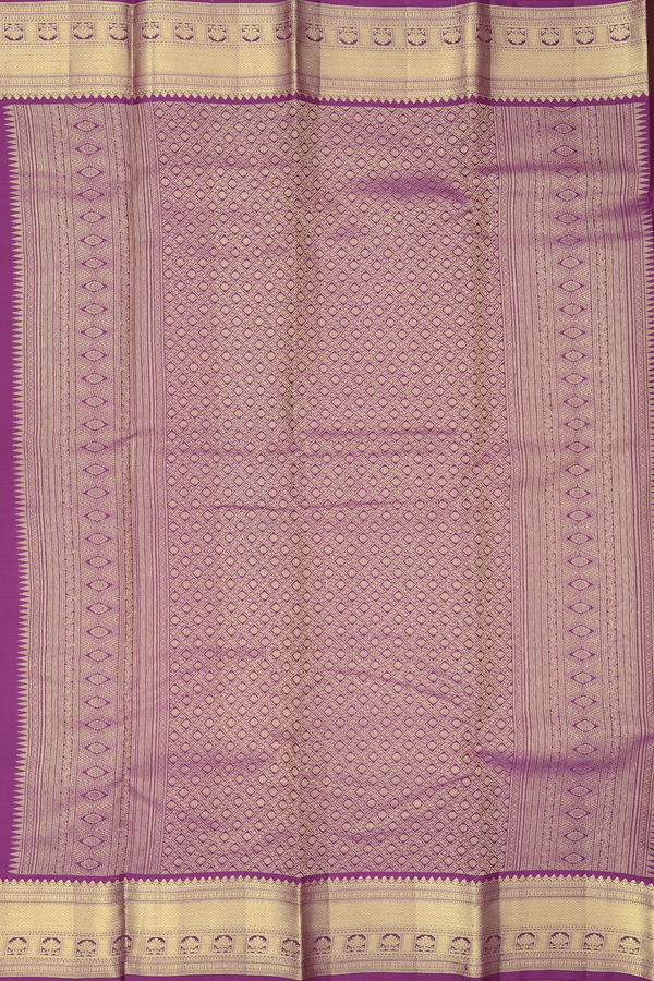 Kanchipuram Silk Saree In Purple With Zari Buttas