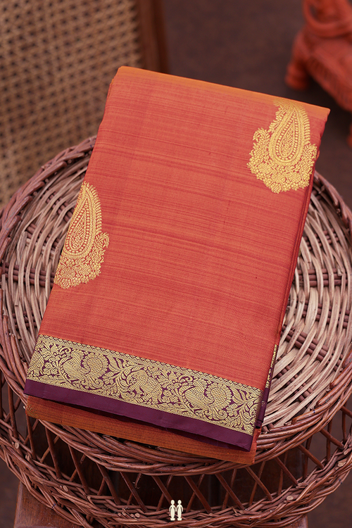 Kanchipuram Silk Saree In Rust Orange With Paisley Motifs