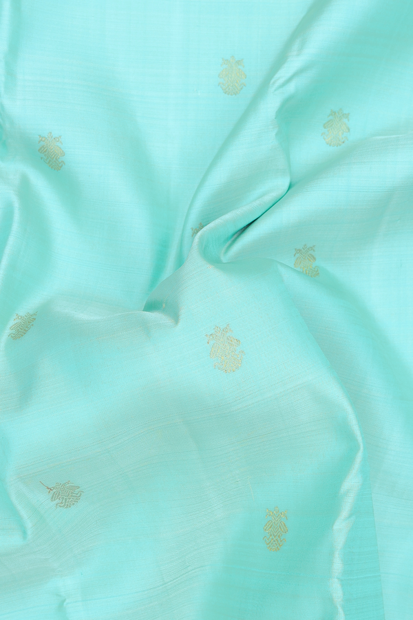 Kanchipuram Silk Saree In Blue With Iruthalai Pakshi Buttas