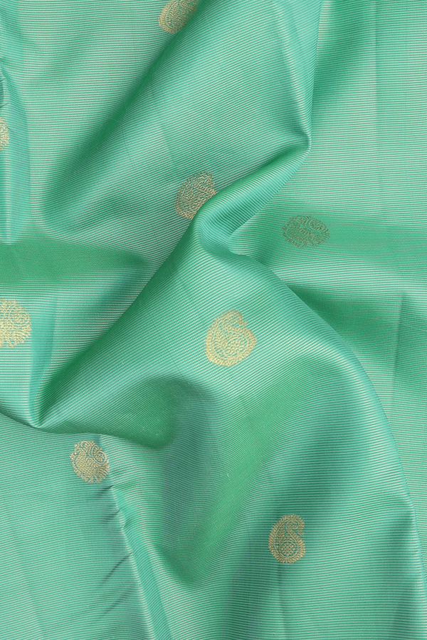 Kanchipuram Silk Saree In Green Along Stripes With Buttas
