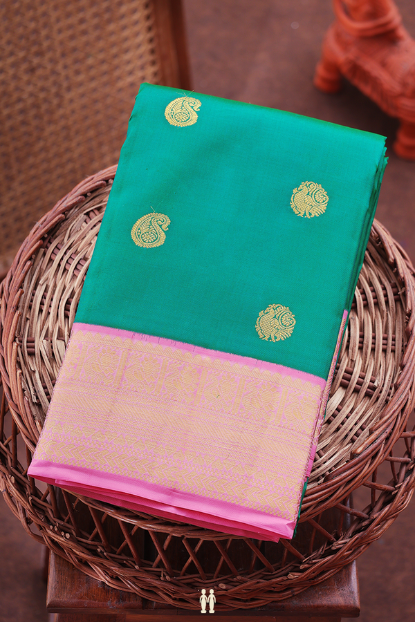 Kanchipuram Silk Saree In Peacock Green With Paisley Buttas