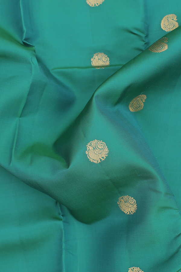 Kanchipuram Silk Saree In Peacock Green With Paisley Buttas