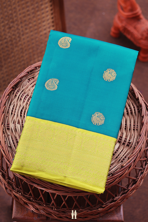 Kanchipuram Silk Saree In Teal Blue With Paisley Buttas