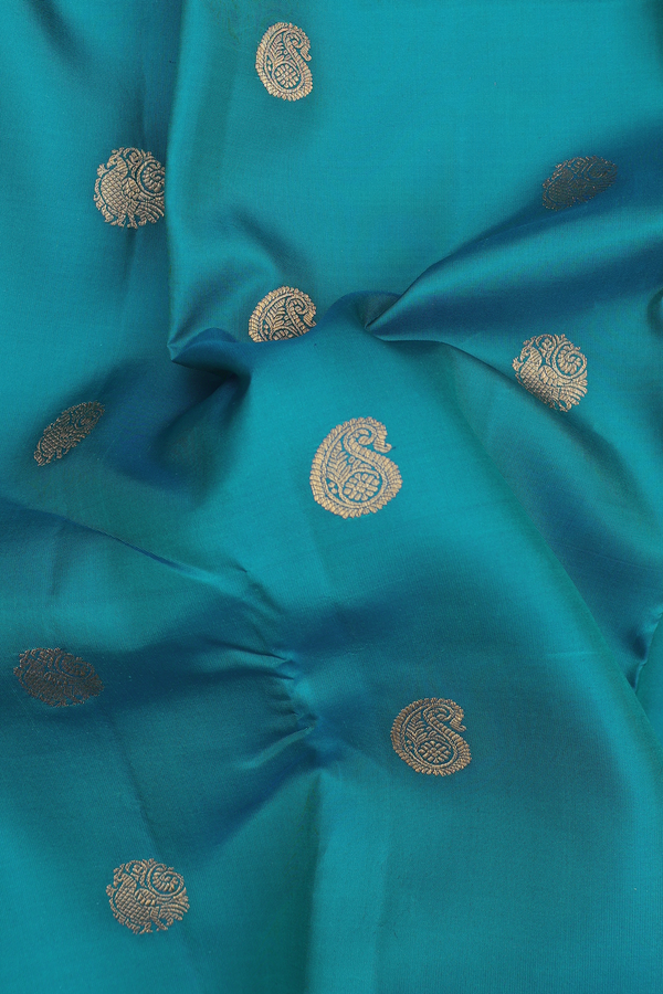 Kanchipuram Silk Saree In Teal Blue With Paisley Buttas
