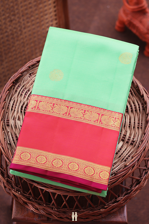 Kanchipuram Silk Saree In Green Along Stripes With Buttas