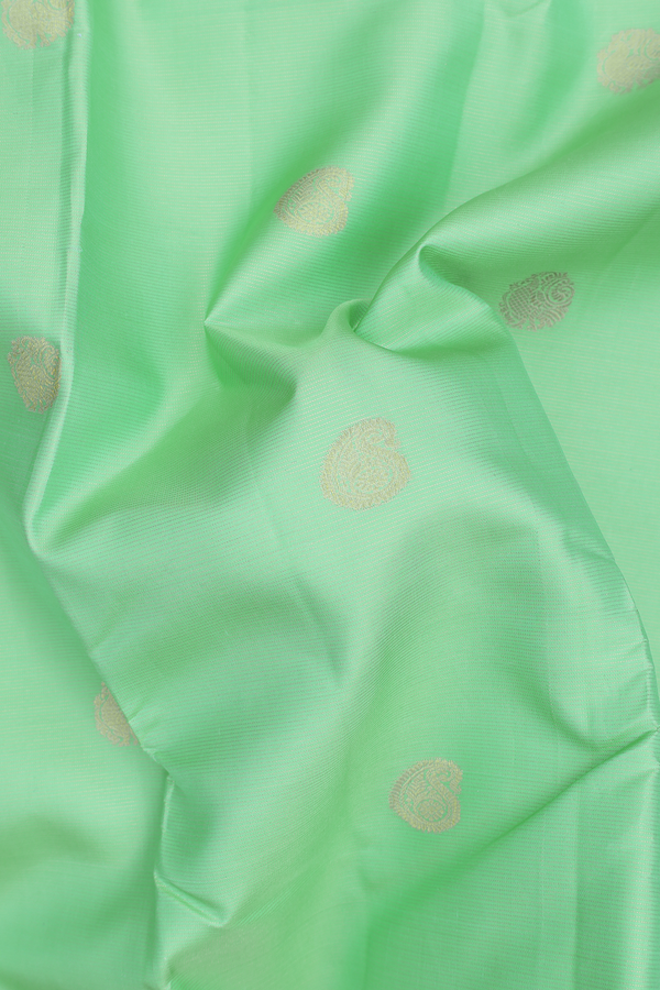 Kanchipuram Silk Saree In Green Along Stripes With Buttas