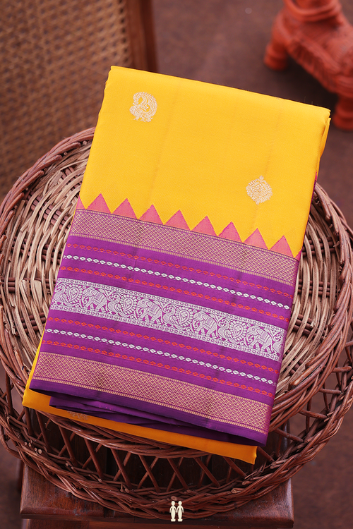 Kanchipuram Silk Saree In Saffron Yellow With Paisley Buttas