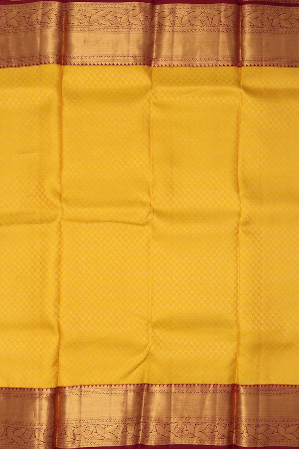 Kanchipuram Silk Saree In Saffron Yellow With Brocade Design
