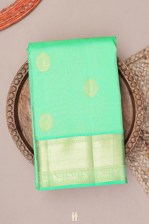 Kanchipuram Silk Saree In Green With Paisley Buttas