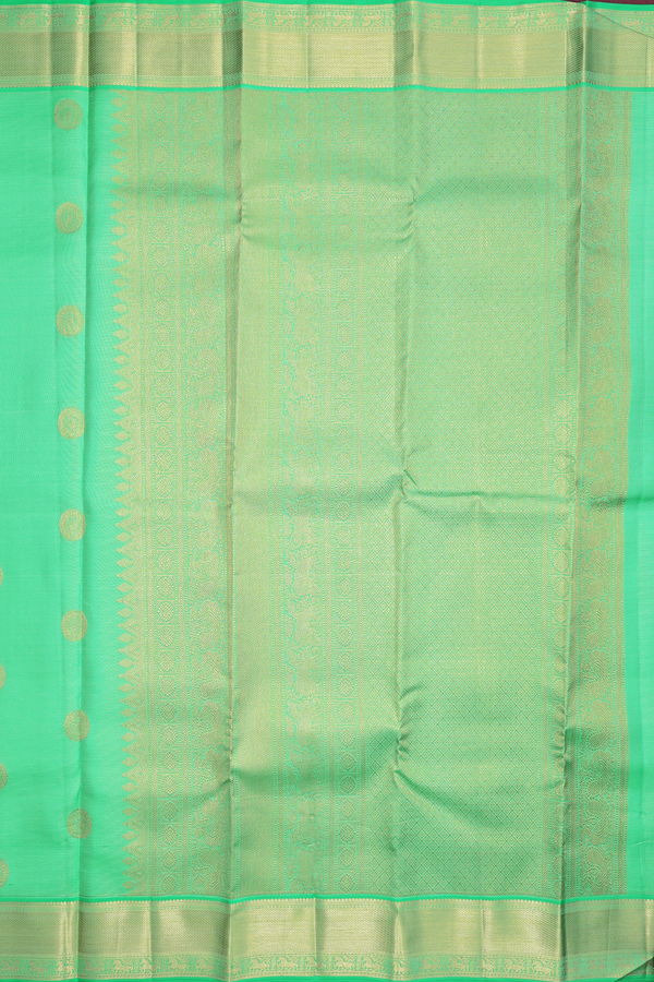 Kanchipuram Silk Saree In Green With Paisley Buttas