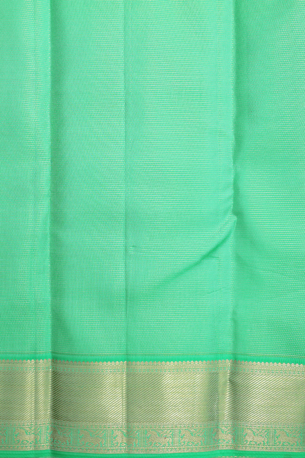Kanchipuram Silk Saree In Green With Paisley Buttas