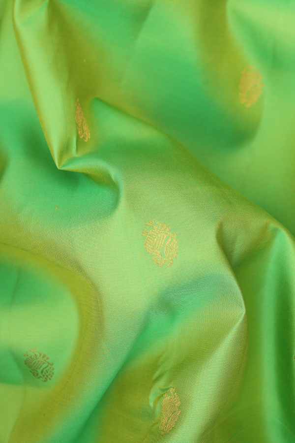 Kanchipuram Silk Saree In Lime Green With Peacock Buttas