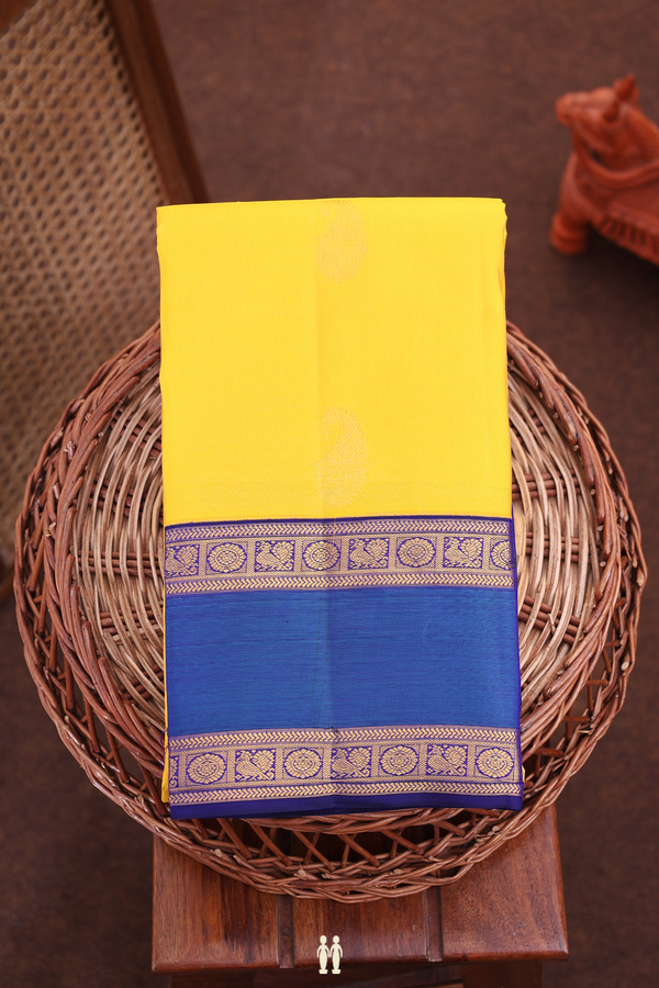 Kanchipuram Silk Saree In Saffron Yellow With Paisley Buttas
