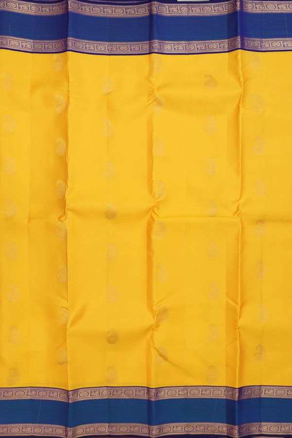 Kanchipuram Silk Saree In Saffron Yellow With Paisley Buttas