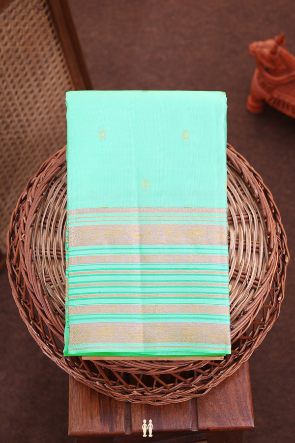 Kanchipuram Silk Saree In Pastel Sea Green With Floral Buttis