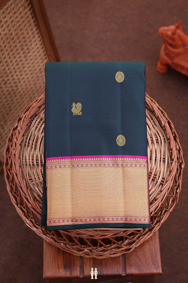 Kanchipuram Silk Saree In Bottle Green With Peacock Buttas