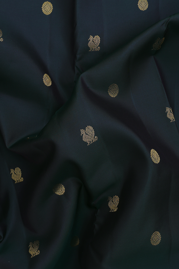 Kanchipuram Silk Saree In Bottle Green With Peacock Buttas