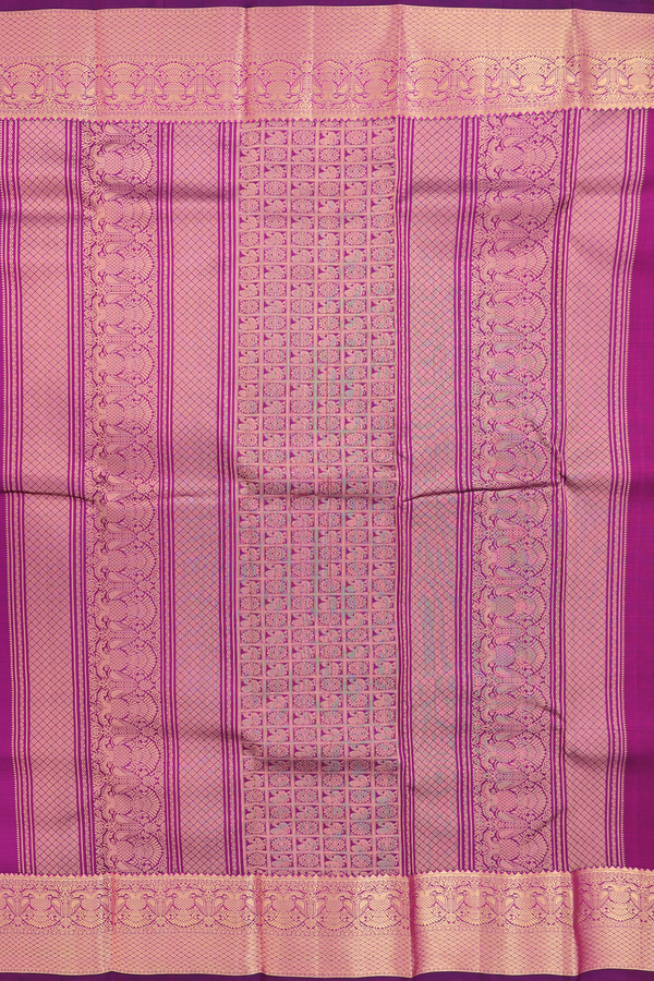 Kanchipuram Silk Saree In Purple With Floral Buttas