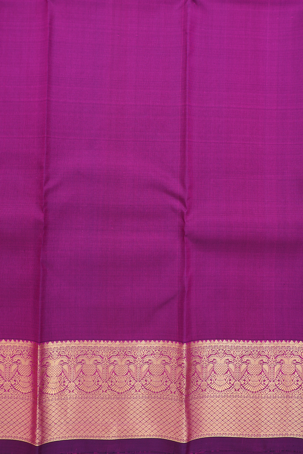 Kanchipuram Silk Saree In Purple With Floral Buttas