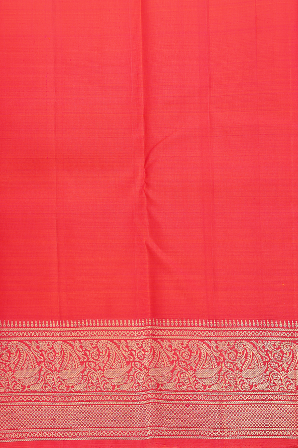 Kanchipuram Silk Saree In Coral Red With Zari Buttas