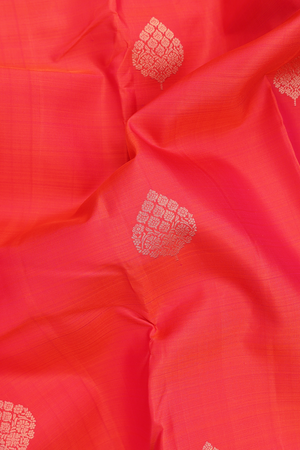 Kanchipuram Silk Saree In Coral Red With Zari Buttas