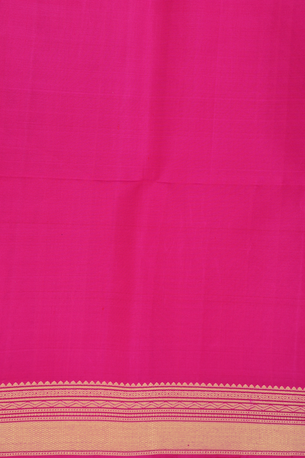 Soft Silk Saree In Black With Zari Buttas
