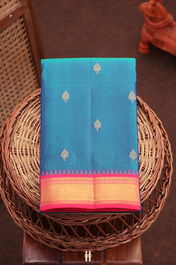 Kanchipuram Silk Saree In Teal Blue With Zari Buttas